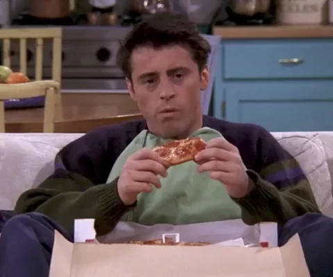 Joey from friends eats a pizza slice. He looks confused and says, 'I don't know.'