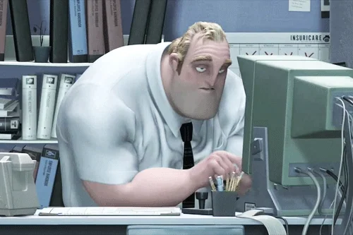  Bob Parr from The Incredibles in a white shirt and tie looking at a computer screen with a sad expression while typing.