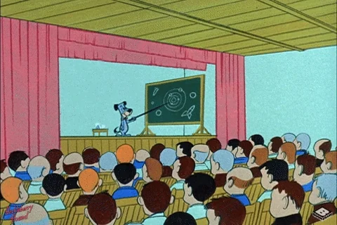 A cartoon dog teaching a group of students in a lecture hall.