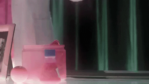 Mad scientist pouring pink fluids into beaker GIPHY