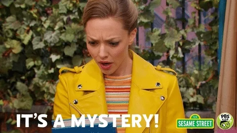 Clip from Sesame Street. Amanda Seyfried looks up from a book and says, 'It's a mystery!'.