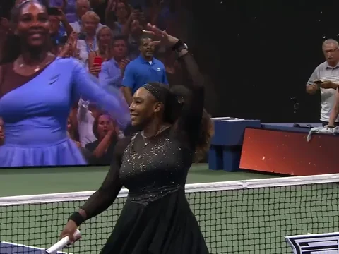 Serena Williams twirling at the end of a match
