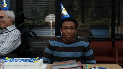 A person with a party hat on