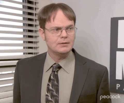 Dwight Schrute looking pensive with text, 