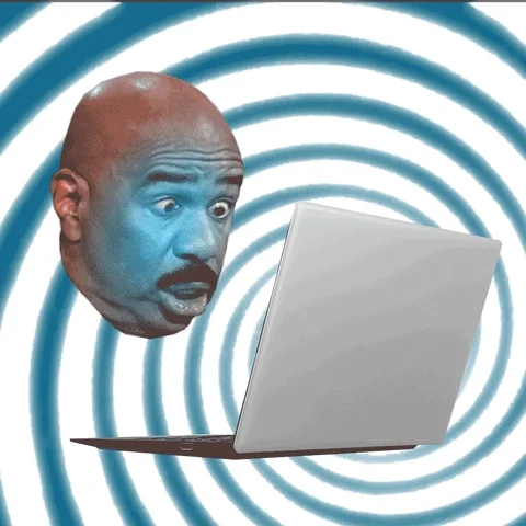 Steve Harvey's floating head. He looks worried as he tries to answer emails on his laptop.