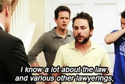 GIF: Bearded man shakes hand of man in a suit while saying, ' I know a lot about the law and various other lawyerings.'