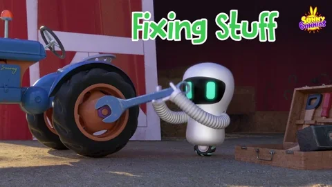 A robot attempts to fix the wheel of a tractor. The wheel pops off and rolls away.