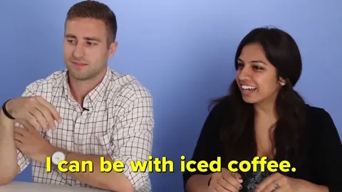 Two people sit down and someone serves them a drink. One says, 