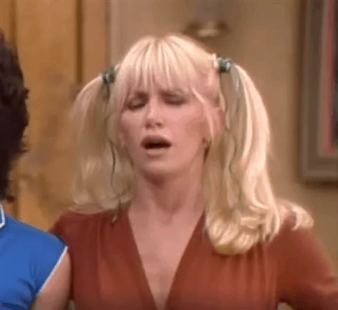 Suzanne Somers from Three's Company. She puts her finger to her cheek while thinking.
