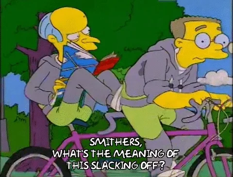Gif shows a man riding a tandem bike with a free rider. The text says 