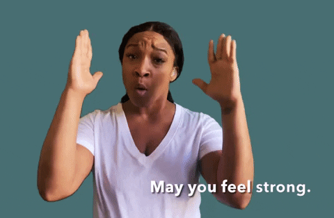 Women using sign langue to say 'may you feel strong.'