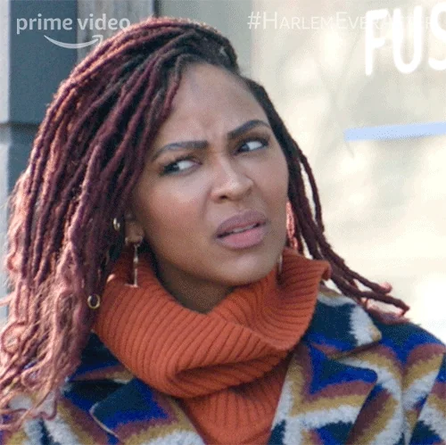 A woman looks confused.