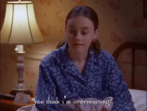 A girl in her pajamas nodding and saying, 'You think I'm overreacting?'