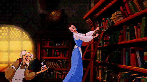 A Disney princess in a library happily showcasing all her books