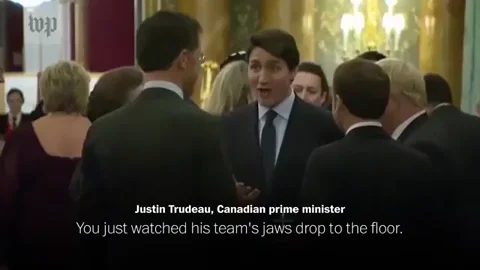 Canadian Prime Minister Justin Trudeau shares a joke with NATO country leaders.