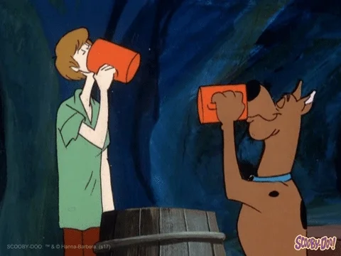 Shaggy and Scooby Doo guzzling down coffee.