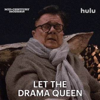 Nathan Lane in a bathrobe and scarf. He says,  