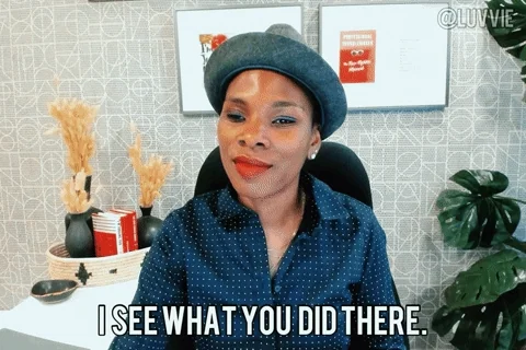 A woman points her finger and says, 