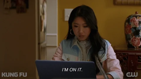 A woman on a laptop says, 