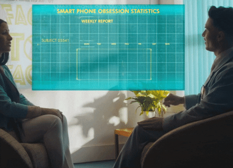 A person presenting data on a screen