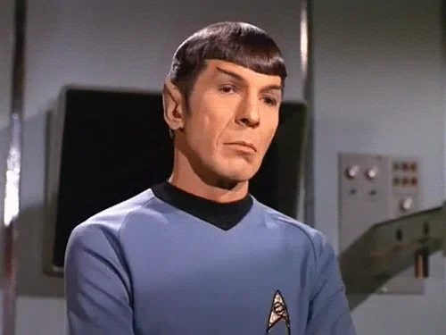 Officer Spock, from Star Trek, has a serious expression and says 