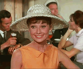 Audrey Hepburn waving