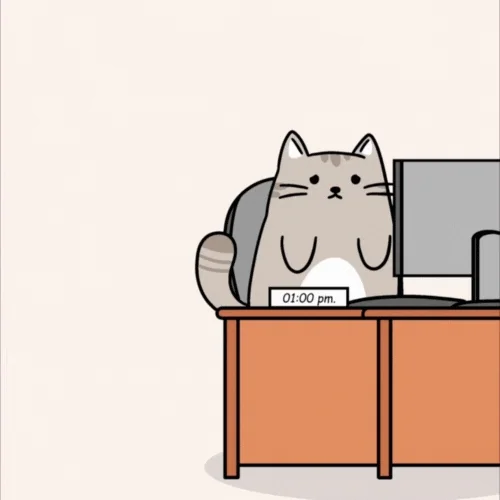 A cat employee working at a desk is told by the cat boss,