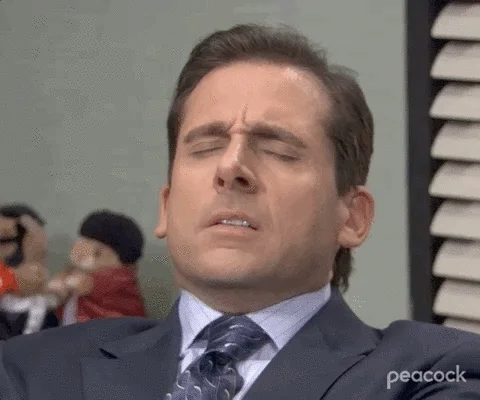 Steve Carell has is eyes closed, contemplates something for a second and says okay as he opens his eyes. 