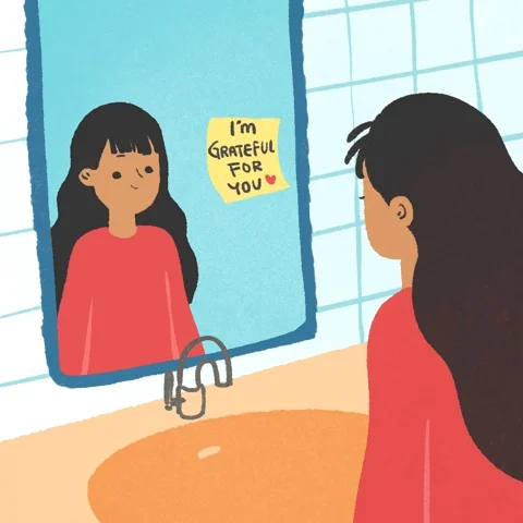 A person looking in the mirror. A yellow post-it note on the mirror says: 