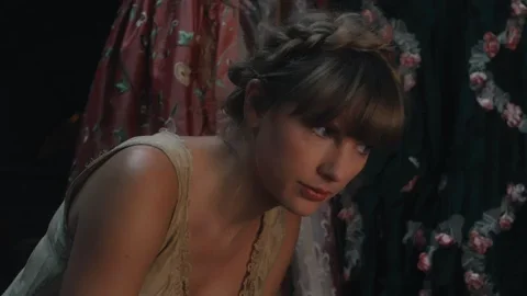 Taylor Swift with a thinking expression. What The Wtf GIF by Taylor Swift