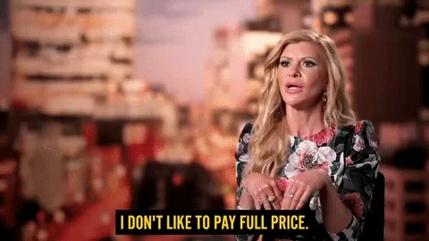 A woman speaks while gesturing, with the caption “I don’t like to pay full price” written at the bottom of the screen.