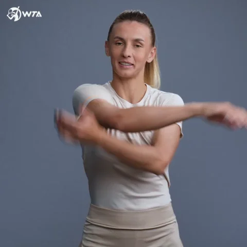A woman stretching her arms