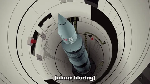 A nuclear missile in a silo while alarms blare