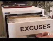 A person flipping through a filing cabinet marked 'Excuses'