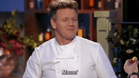Gordon Ramsay claps his hands and says, "Mmm!"