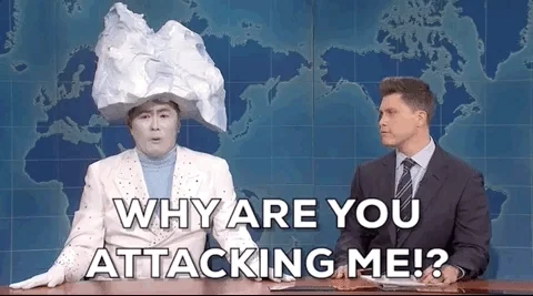 A man dressed as an iceberg asks an anchorman next to him, 