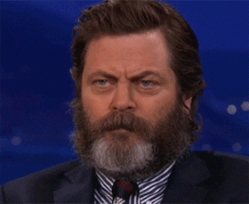 Nick Offerman trying not to laugh