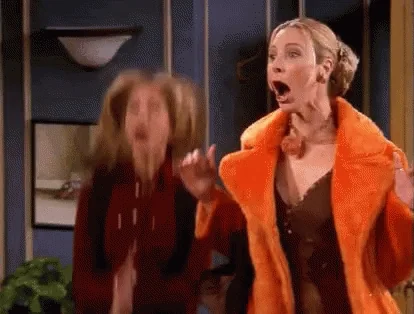 Jennifer Aniston and Lisa Kudrow as Rachel and Phoebe from Friends clapping excitedly while jumping up and down .