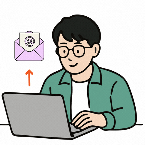 A man sending emails on his laptop.