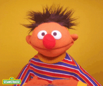 Ernie from Sesame Street gives a thumbs up.