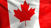 A Canadian flag blows in the wind.