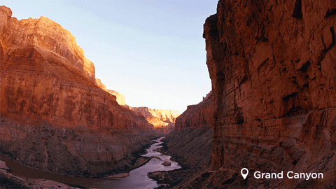 GIF of a stream of water running between two canyons in the Grand Canyon.