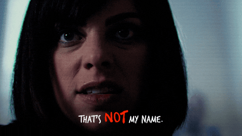 Gif of an angry scary-looking woman aggressively saying, "That's not my name." The word NOT is highlighted in blood red.