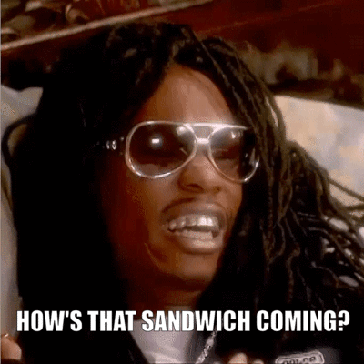 Dave Chapelle dressed as Lil Jon asking, 'How's that sandwich coming?'