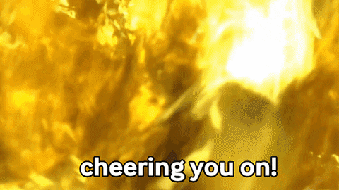 A woman smiling while shaking a pom pom. The text reads: 