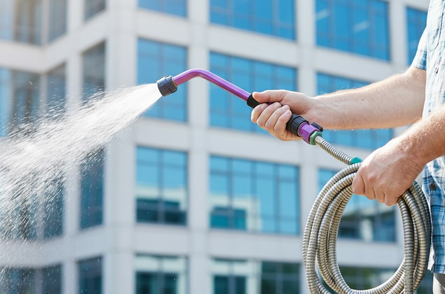 Hose pipe being used in hot weather