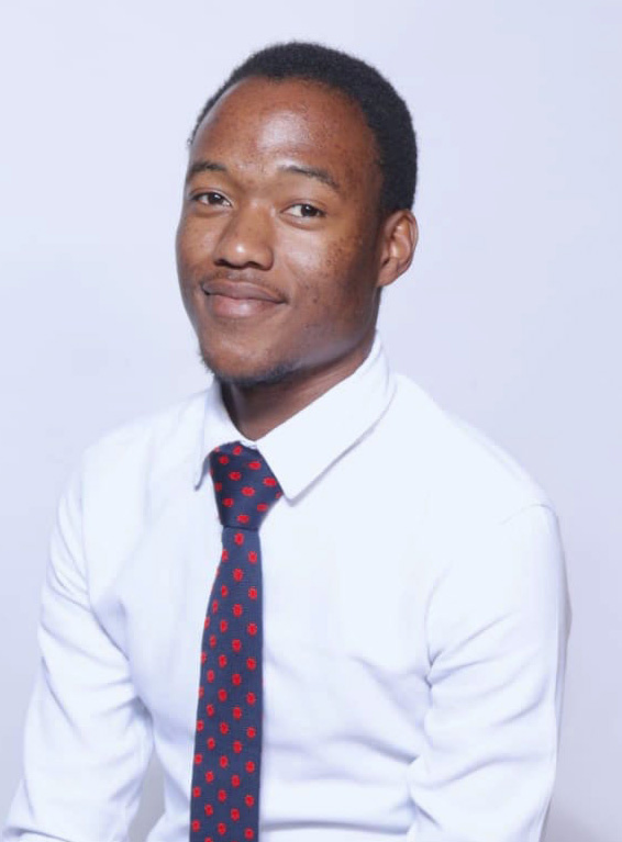 Lehlohonolo Mofula header image, a man smiling wearing a white shirt, with a blue tie
