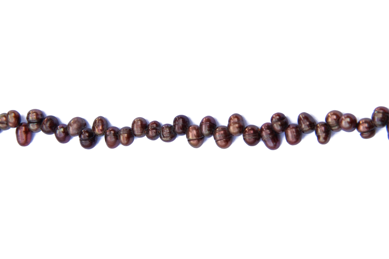Perle en nacre - graine de riz - rose foncé x 10