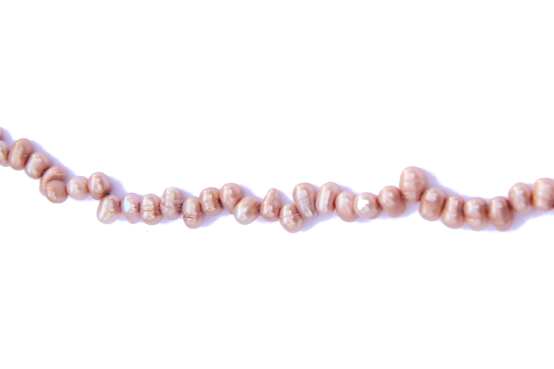 Perle en nacre - graine de riz - rose clair x 10
