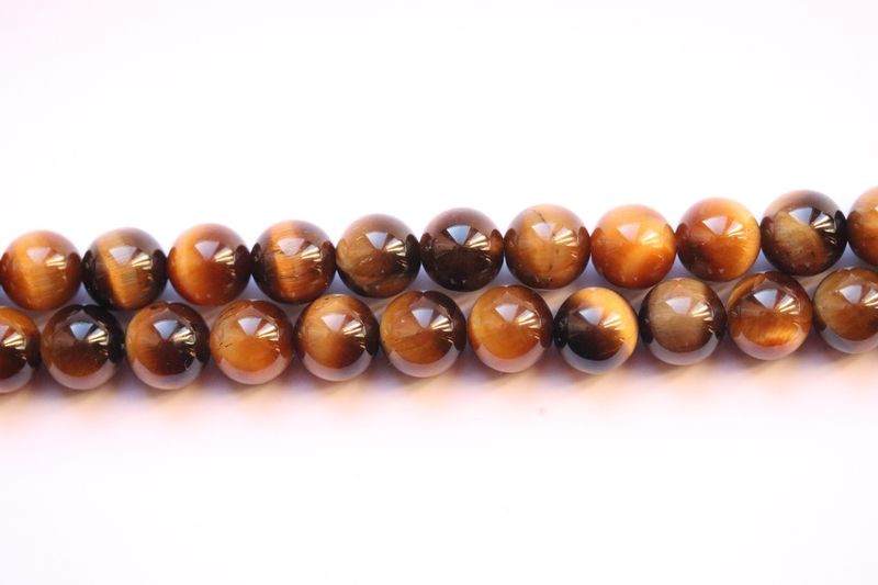 Perle en pierre naturelle - oeil de Tigre - vendu par 19 cm